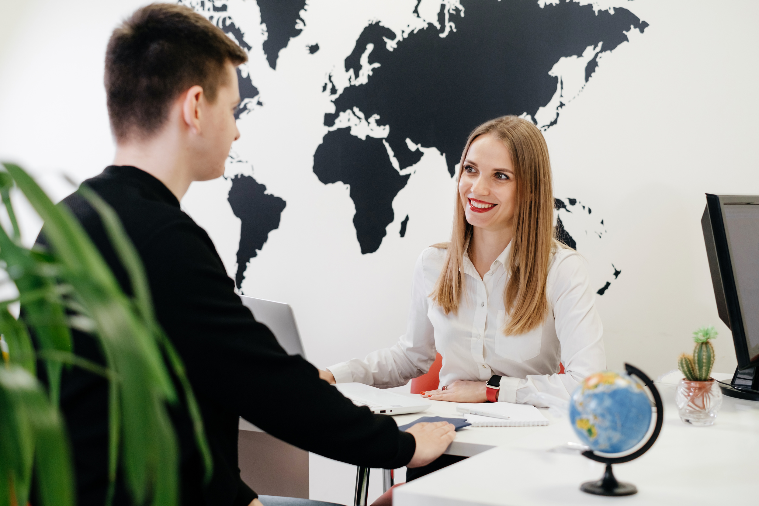 Travel Agent Talking to Customer